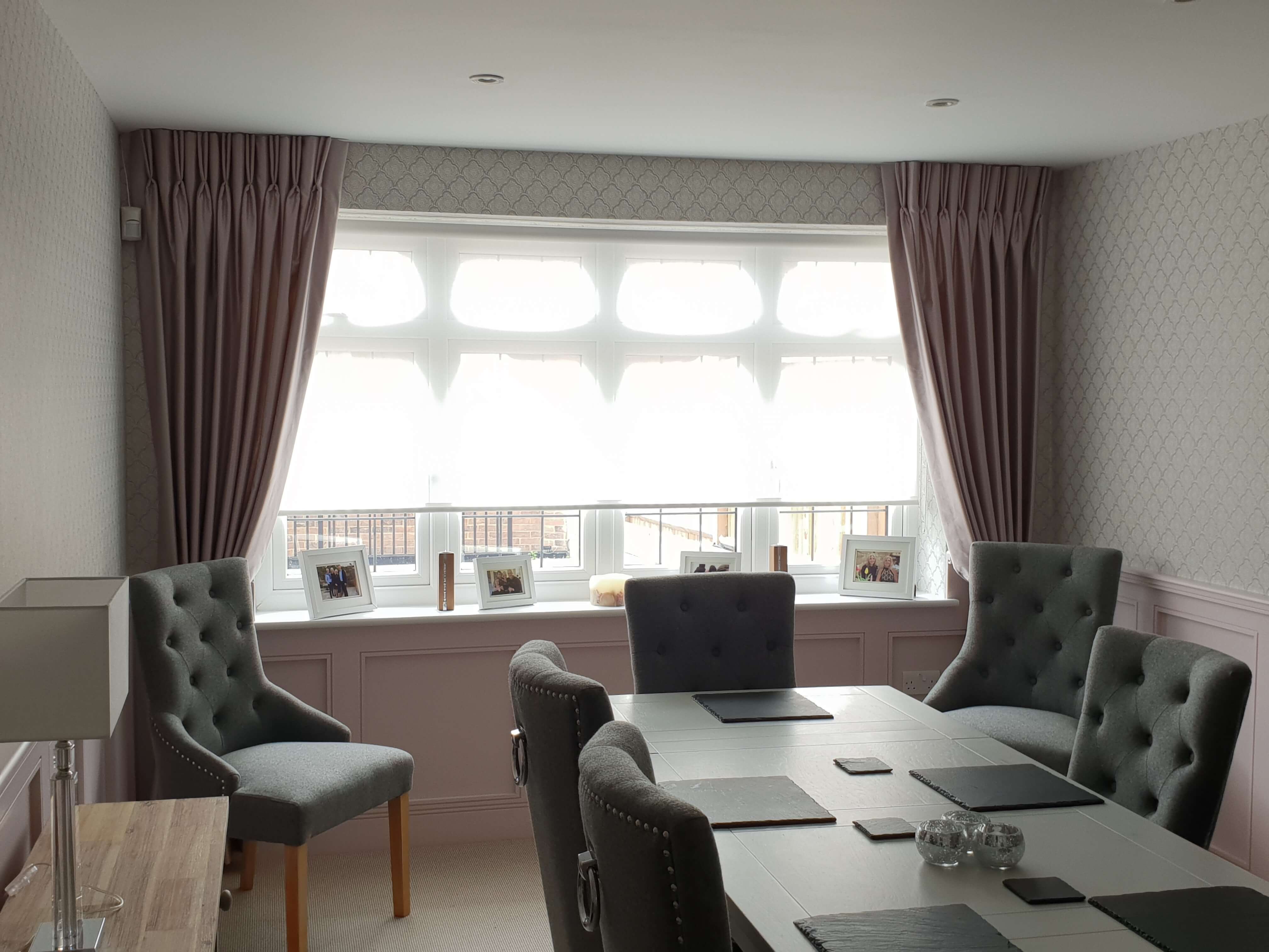 Purple dress curtains in dining area