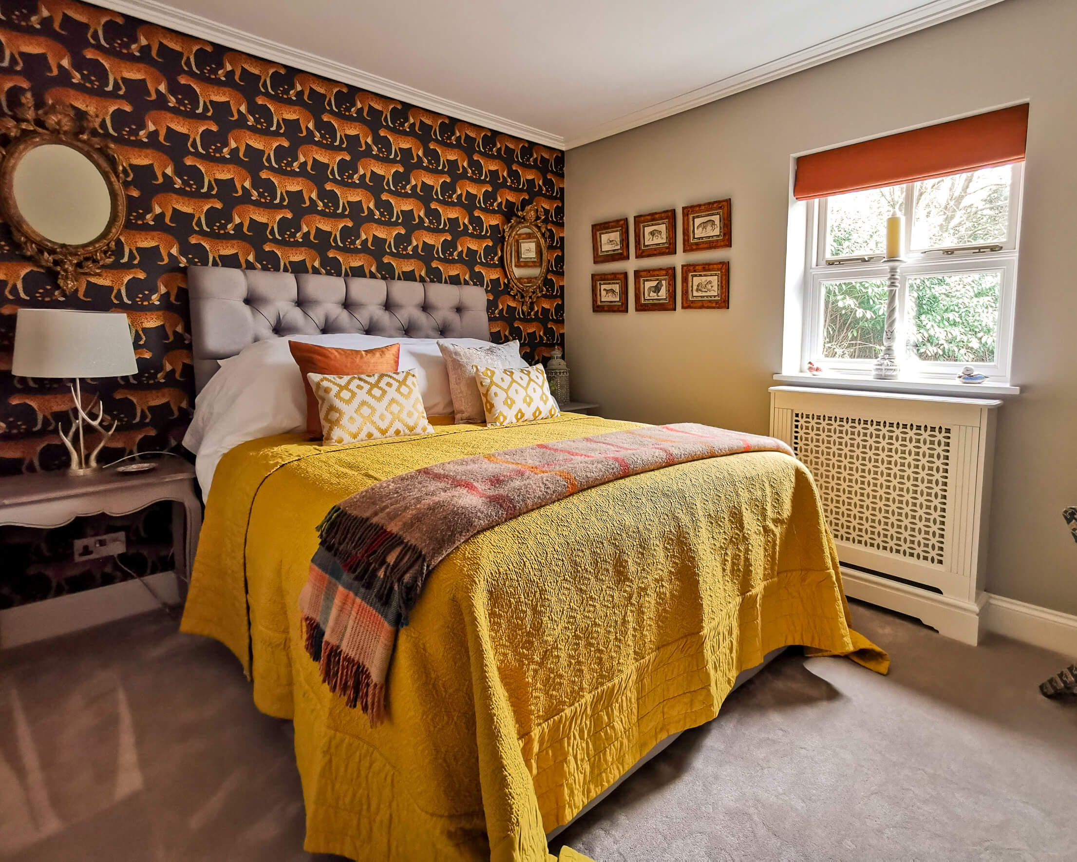 Orange roman blind and bed dressings