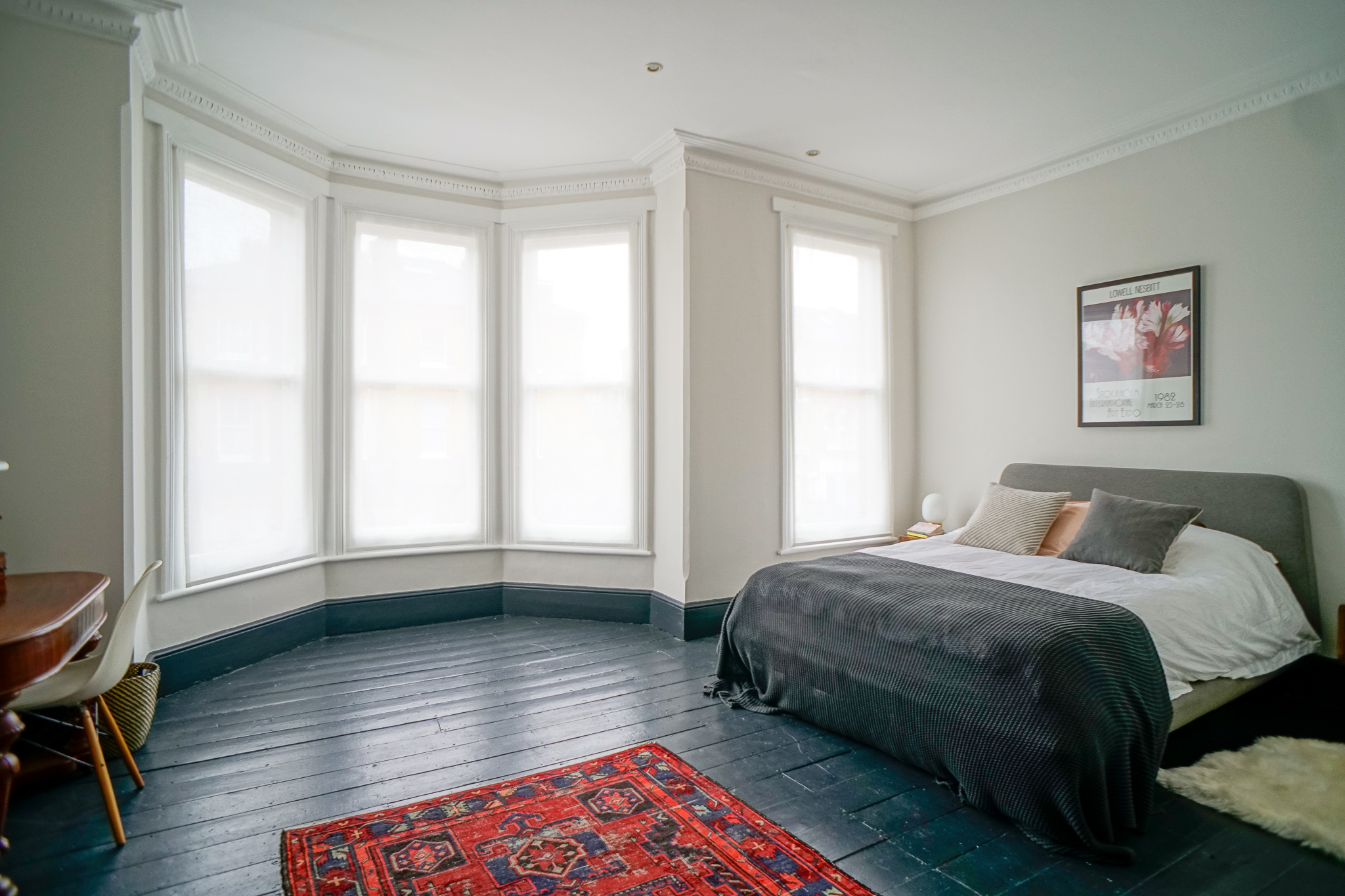 Sheer privacy panels in bedroom