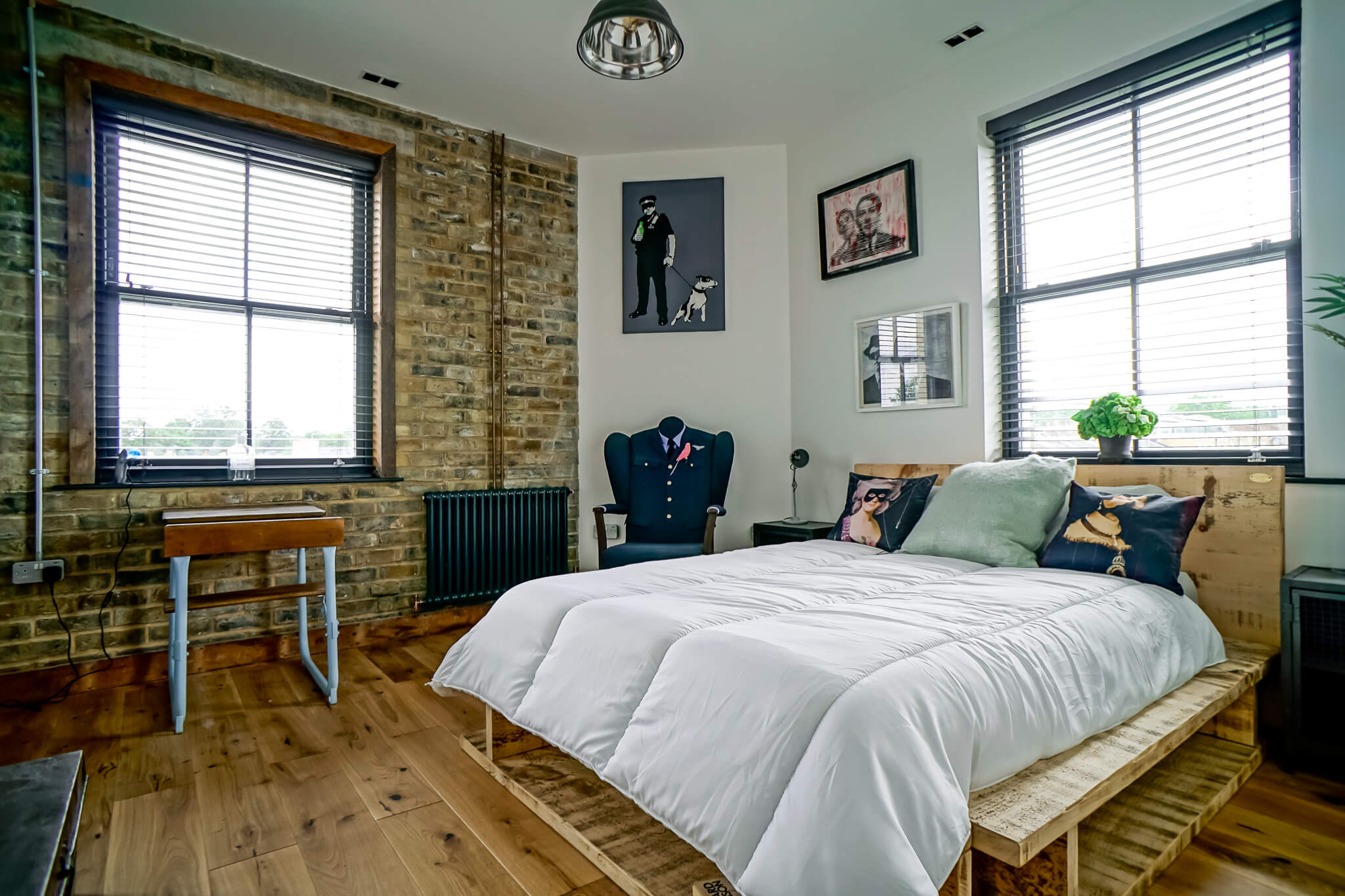 Bedroom with black venetian blinds