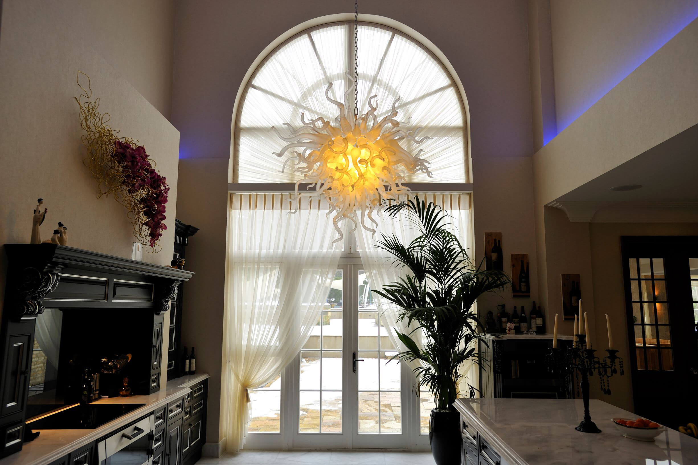 Decorative sheer curtains in a kitchen